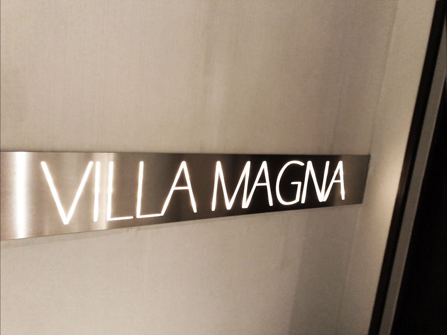 Villa Magna hotel sign in restaurant