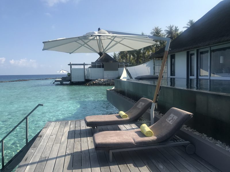 Cheval Blanc Maldives water villa terrace with sun lounges