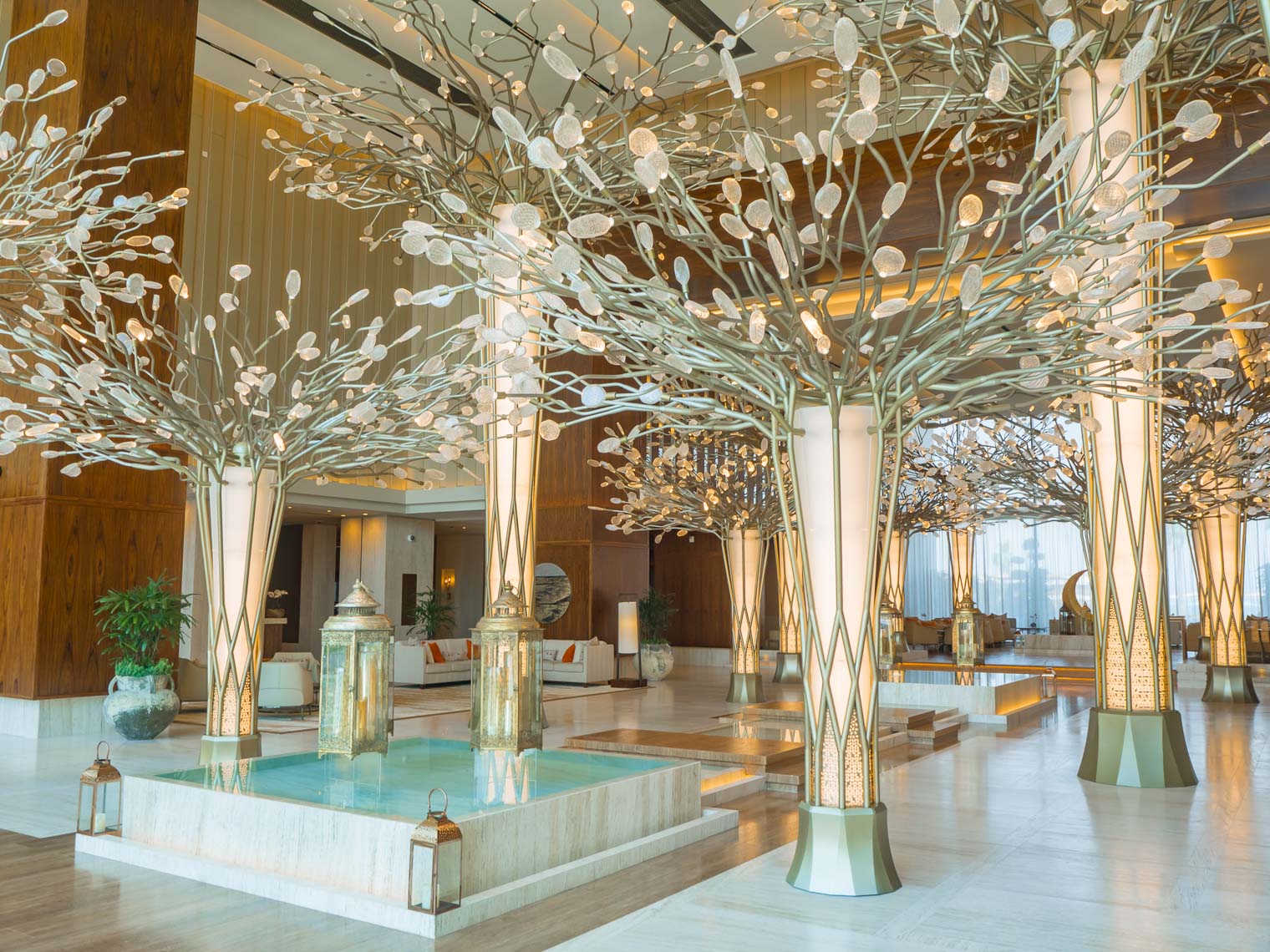 Mandarin Oriental Jumeira Dubai lobby bronze trees