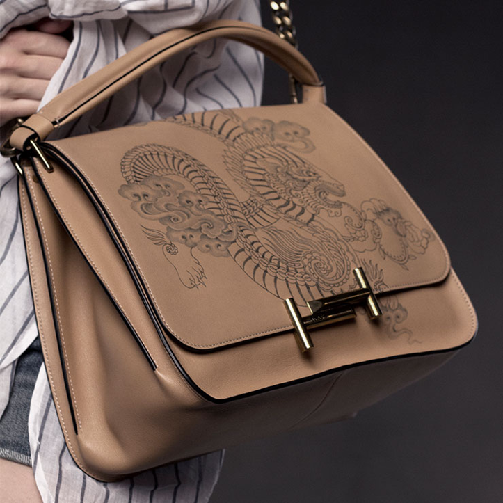 Double T handbag. Tod’s cooperates with the famous tattooist