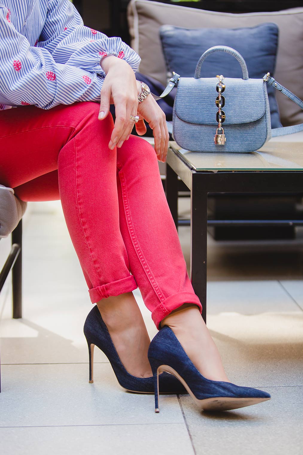 Gianvito Rossi pumps, red jeans and Louis Vuitton bag