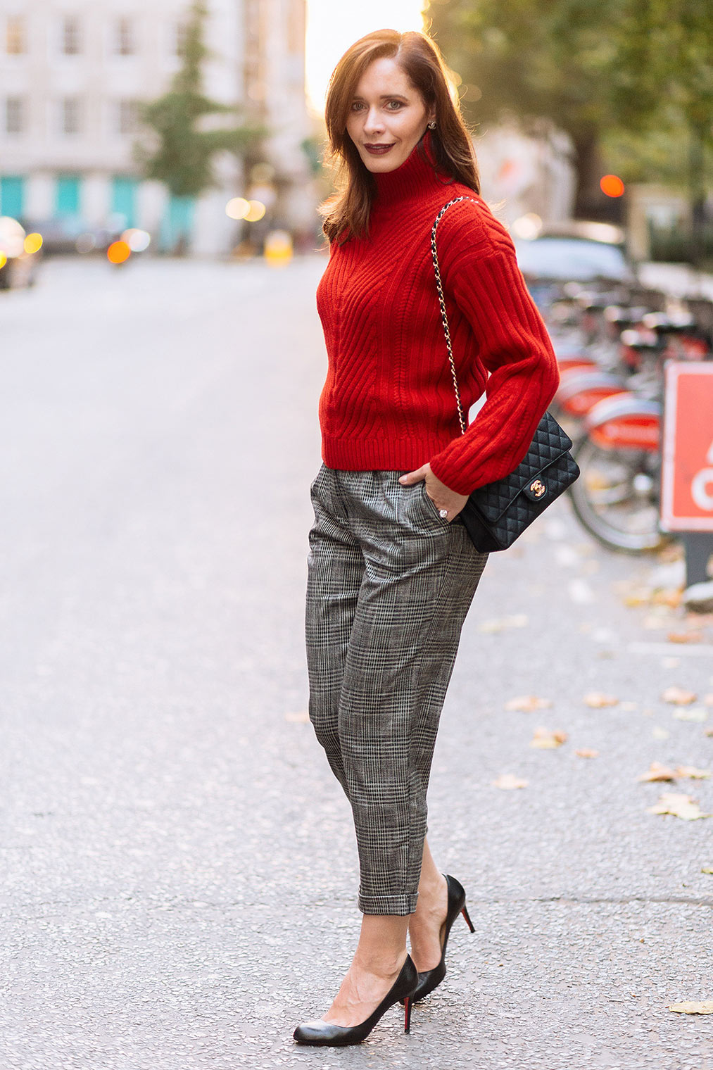 Red sweater and checked trousers fall 2017