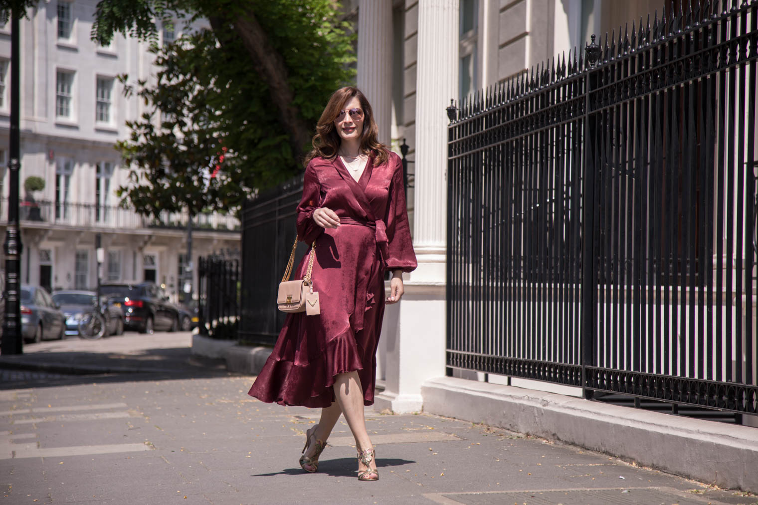 Petra from Chic Journal wearing burgundy wrap dress