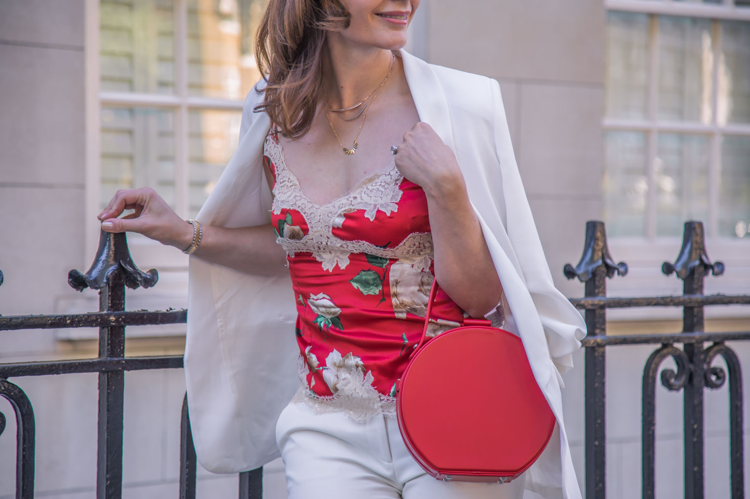 Dolce & Gabbana lace top and Nico Giani bag